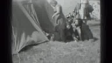 Saint Petersburg Russia (1967): 2 men Crawling Out Of The Tent On The Grass