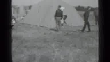 Saint Petersburg Russia (1967): Men Camp In An Open Field And Begin To Sit On A