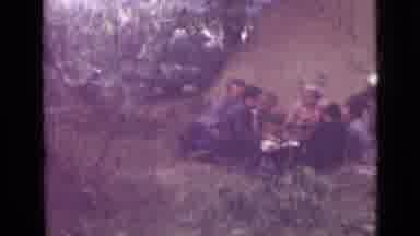 Saint Petersburg Russia (1967): Nine People Have A Picnic While Camping Besides A
