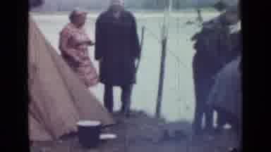 Saint Petersburg Russia (1967): Group Of People Camping By The River Working To