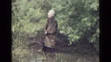 Saint Petersburg Russia (1967): People Standing Outside Near A Wooded Area And