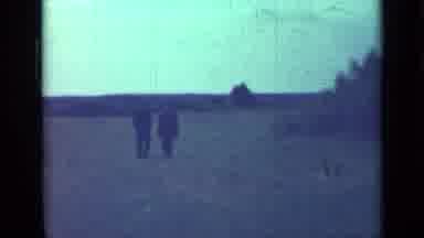 Saint Petersburg Russia-1967: Two Men Walking In A Field