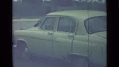 SAINT PETERSBURG RUSSIA-1967: Vintage White Sedan Parked in Quiet Lot