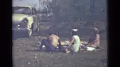 Saint Petersburg Russia (1967): People Having A Picnic By The Lake With Their Cars
