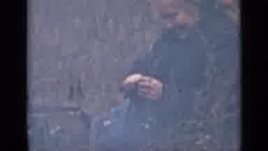 Saint Petersburg Russia (1967): Woman Peels Something With A Knife And Gets Ready