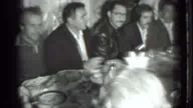 Moscow Russia (1975): A Group Of People Sitting At A Table Celebrate Something
