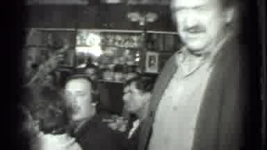 Moscow Russia (1975): Many Men Sit At A Long Table Cluttered With Bottles Of