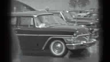 Moscow Russia (1983): Vintage Clip Of People Grouped Together Observing A Car Show