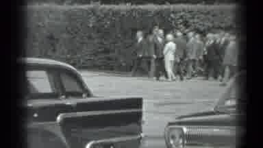 Moscow Russia (1983): People Walking In A Group And Chatting With Some Important