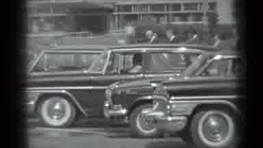 Moscow Russia (1983): A Group Of Official Men Leaving And A Queue Of Cars In A