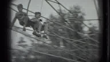 Moscow Russia (1983): People Riding Amusement Park Chairlift Ride On A Clear Day
