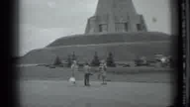 Moscow Russia (1983): People Talking About Large Concrete Structure On A Hill With
