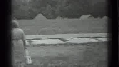 Moscow Russia (1983): People Walking Towards A Village And The Girl Points At The