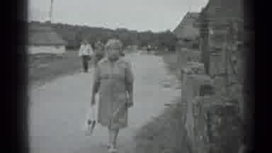 Moscow Russia (1983): Woman With Curly Hair Wearing Dress And Holding Bag Walking