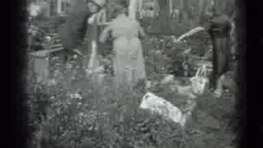 Moscow Russia (1983): Collecting Trash From A Yard Which Appears To Be A Cemetery