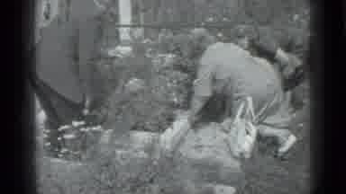 Moscow Russia (1983): People Planting Flowers In A Garden Or In A Grave