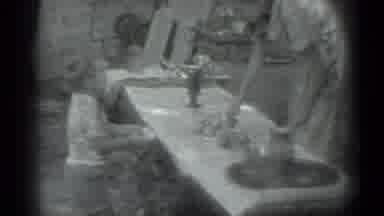 Moscow Russia (1983): Young Boy Picks His Nose Backs Away From Table And Laughs