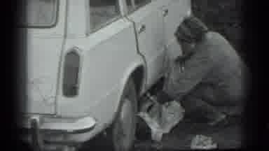 Moscow Russia (1983): The Lady Is Covering Something Under Her Car