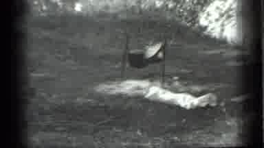 Moscow Russia (1983): A Large Cooking Pot Sits Alone At A Campsite Near A Body Of