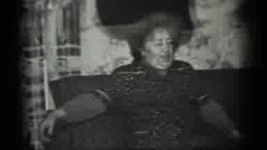Moscow Russia (1983): An Elderly Woman Sits On A Couch Followed By A Girl Smiling