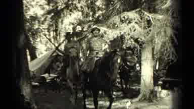 Bend Oregon (1937): Caravan Of Men In Black And White With Horses Loaded With