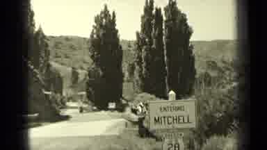 Bend Oregon (1937): Meeting Of Old Acquaintances In A Pleasant Place With Plants