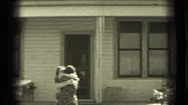 Bend Oregon (1937): The Rancher Lets The Sheep Into The Pen As He Ties Up His
