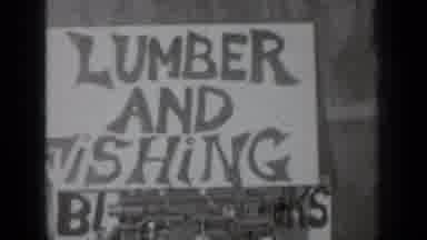 Klamath California (1937): A Sign That Reads Lumber And Fishing Is Covering An Old