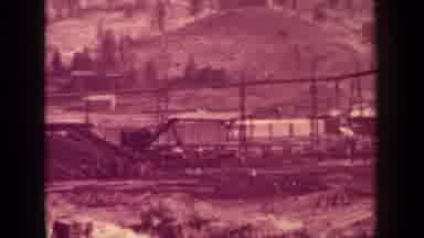 Klamath California (1937): Crane Lifting Objects Out Of Water On A Sunny Day
