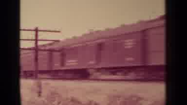 Klamath California (1937): Train Driving Down The Train Tracks Then Car Parked On