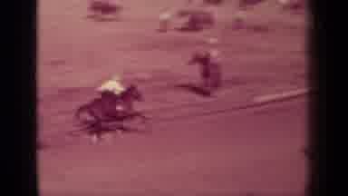 Klamath California (1937): Many Men Riding A Bucking Horses Between A Horse Race