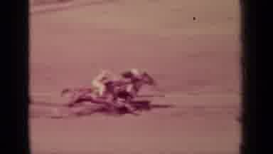 Klamath California (1937): View Of Horse Racers Going Around Curve On A Bright