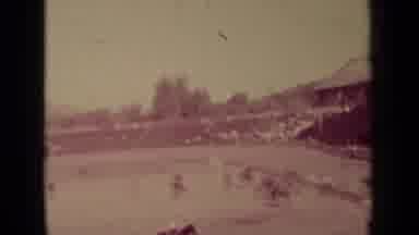 Klamath California (1937): Spectators Watch From The Stands Surrounding A Dirt