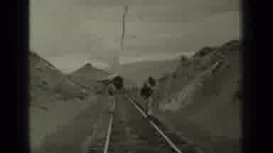 Klamath California (1937): Kids Playing On A Train Tracks While A Train Is