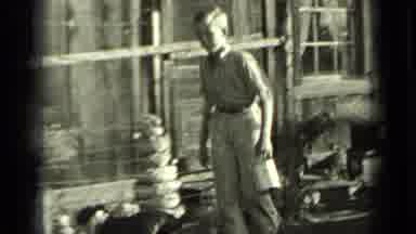 Klamath California (1937): Young Boy Walking With His Pet Dog Down The Street