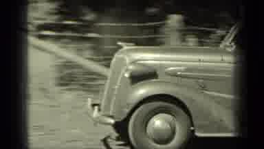 Klamath California (1937): Vintage Video Showing An Older Person Watching A Car