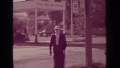 Medford Oregon (1937): Lady Crossing The Road And Walking Towards The Camera To