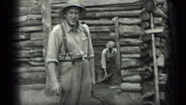 Long Lake Canada (1939): Man In Helmet Looks To Smiling Girl Then To Older Man In