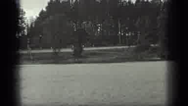 Long Lake Canada (1939): Car Driving Along A Riverside And Men Standing Beside A