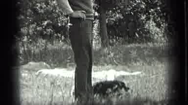 Long Lake Canada (1939): Man With Dog At The Park