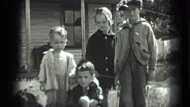 LONG LAKE CANADA-1939: Children And Dog Stand In Front Of The Family House