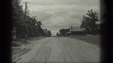 Long Lake Canada (1939): A Empty Highway In A Small Hamlet Sees Two Ladies Step