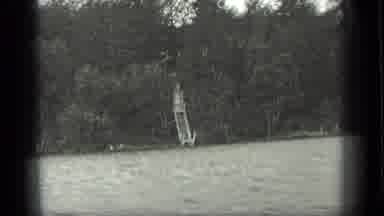 Long Lake Canada (1939): People On Top Of A Questionable Safety Canoe On A Lake