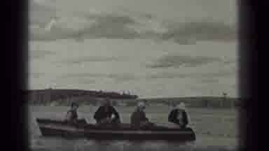 Long Lake Canada (1939): People On A Small Boat In A Lake