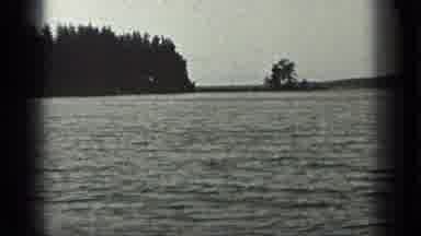 Long Lake Canada (1939): Video Of Water And Then A Jump Cut Of A Couple Of Trees