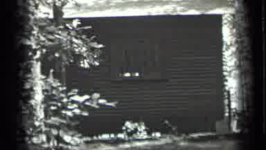 Long Lake Canada-1939: A Solitary Cabin In The Woods With A Water Pump Outside