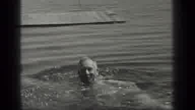 Long Lake Canada (1939): A Black And White Video Of A White Man Swimming In A Lake