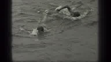 Long Lake Canada (1939): Two Men Swimming Together One Gets Out Of Water The Other