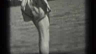 Long Lake Canada (1939): A Man On A Boat On A Lake