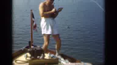 Long Island New York (1948): Man In Swimsuit And Captain Hat Tries To Reel In Big